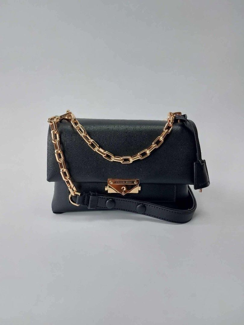 Authentic Michael Kors MK medium CECE Sling Bag (Category: Luxury Bags & Wallets) located in Quezon City. Submitted by hollowwillow (Listing ID 1398445078, Image 1). Description: MK medium CECE sling bag 5'h x 7'w x 3'd inches brand new with tags and dustbag ⚠️ STRICTLY PAYMENT FIRST AND WE DO THE BOOKING For same day delivery via lalamove For courier, we use Gogo xpress or J&T 📍QC.