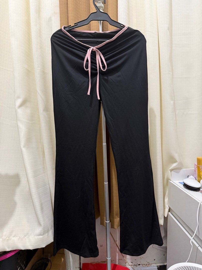 Black and Pink Low waisted Flare Pants (Category: Other Bottoms) located in Manila. Submitted by notchikachu (Listing ID 1398472809, Image 3). Description: New Low waisted Flare Pants Never Used Size: Small (stretchable) Loc: Sta Ana Manila .