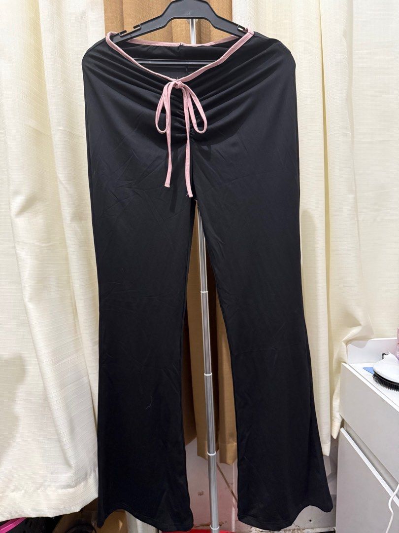 Black and Pink Low waisted Flare Pants (Category: Other Bottoms) located in Manila. Submitted by notchikachu (Listing ID 1398472809, Image 2). Description: New Low waisted Flare Pants Never Used Size: Small (stretchable) Loc: Sta Ana Manila .