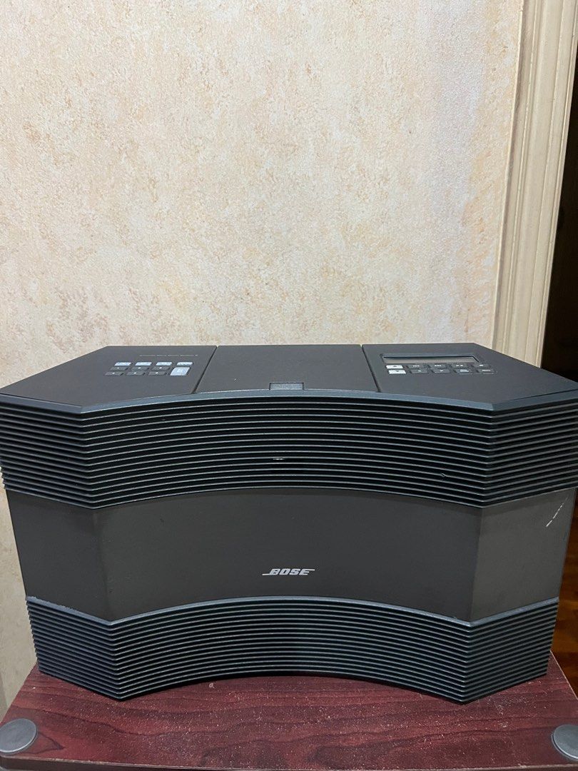 Bose Acoustic Wave Music System III (Category: Other Home Appliances) located in Manila. Submitted by alexissheena (Listing ID 1398357169, Image 1). Description: - Bose Acoustic Wave Music System III - Plays FM, AM, CD, and AUX - Includes preset buttons for easy access - Features a clear display screen - Standard volume, seek/track, and play/pause controls - Menu and options button for advanced settings - Sleek black design Please dm for more det