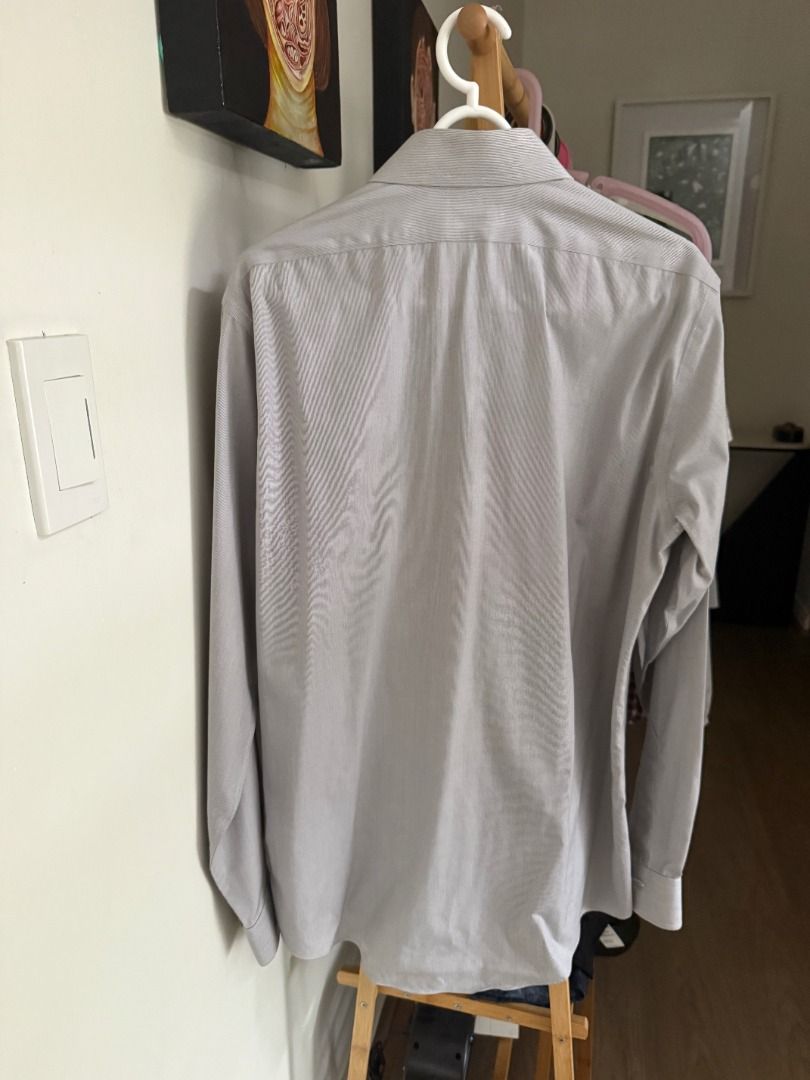 Brooks Brothers Milano Shirt (Category: Tshirts & Polo Shirts ) located in Manila. Submitted by aap616 (Listing ID 1398491722, Image 3). Description: Brand: Brooks Brothers Model: Milano Fit Dress Shirt Color: Light Grey with Fine Pinstripe Size: Medium, 15½ (neck) - 34 (sleeves) (Slim Fit / Milano Cut) Condition: Excellent – gently worn, no stains, discoloration, or fabric wear. Still crisp with strong collar and cuffs. Description: Classic Broo