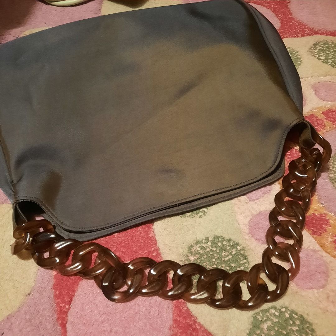 Chain bag (Category: Luxury Bags & Wallets) located in Makati City. Submitted by cuco678 (Listing ID 1398442096, Image 3). Description: Tortoise colorshiftinh from brown to black Gold hardware Vintage.