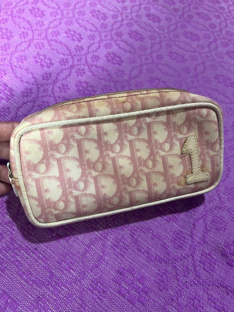 Christian Dior Pink Cosmetic Pouch (Category: Luxury Bags & Wallets) located in Quezon City. Submitted by kayesantos7 (Listing ID 1398391489, Image 3). Description: - Super Sale!!! Authentic Christian Dior cosmetic pouch - Color: Pink - Features the iconic Dior monogram pattern - Secure zipper closure - Includes a small leather tag with the brand name - Marked 'Made in Spain' Selling my Christian Dior Trotter Pink pouch. In good preloved conditio