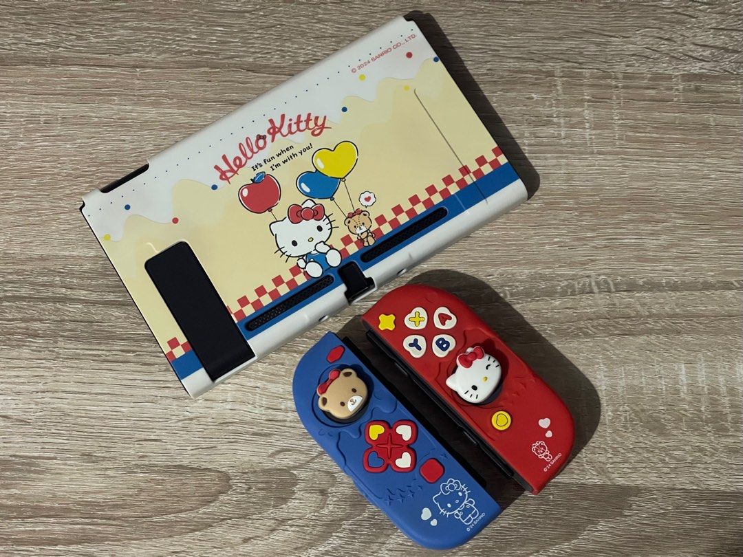 Hello Kitty Switch 1 Gift Box Geekshare (Category: Nintendo) located in Quezon City. Submitted by mariikari (Listing ID 1398457858, Image 2). Description: Package Includes: 1*Switch Carrying Case 2*Joy Con Cover Cases 2*Thumb Grip Caps 1*24 Slots Game Card Case 1*Screen Protector 1*Screen Wiping Cloth 1*Customized Sticker 1*Acrylic Pendant 1*Customized Playstand 1*Switch back Console Protective Case The gift box was purchased from geekshare’s web