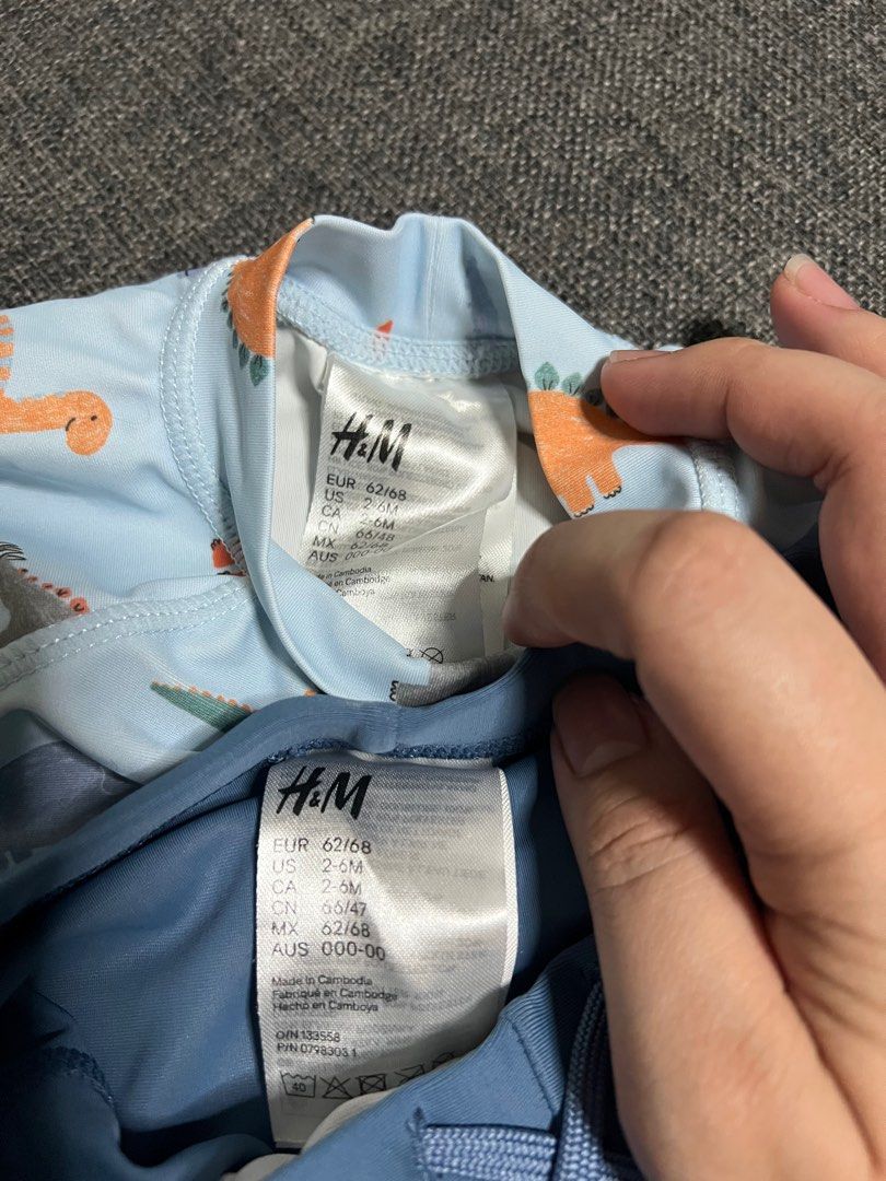 H&M Dinosaur Swimsuit Set 2-6M (Category: Babies & Kids Fashion) located in Makati City. Submitted by all.things.loved (Listing ID 1398405256, Image 2). Description: - H&M baby swimsuit set, perfect for ages 2-6 months. - Features a light blue rash guard with a fun dinosaur print. - Includes matching blue swim shorts. - Rash guard has long sleeves for added sun protection. .