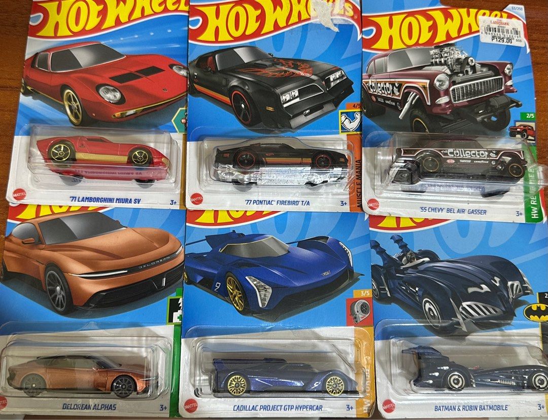 Hot Wheels Diecast Cars (Category: Vehicle & Diecast Models) located in Quezon City. Submitted by lebubbles_ (Listing ID 1398387671, Image 1). Description: - Hot Wheels diecast car collection ₱1200 TAKE ALL - Includes: - '71 Lamborghini Miura SV - '77 Pontiac Firebird T/A - '55 Chevy Bel Air Gasser - DeLorean Alpha - Cadillac Project GTP Hypercar - Batman & Robin Batmobile - All cars are in original packaging..