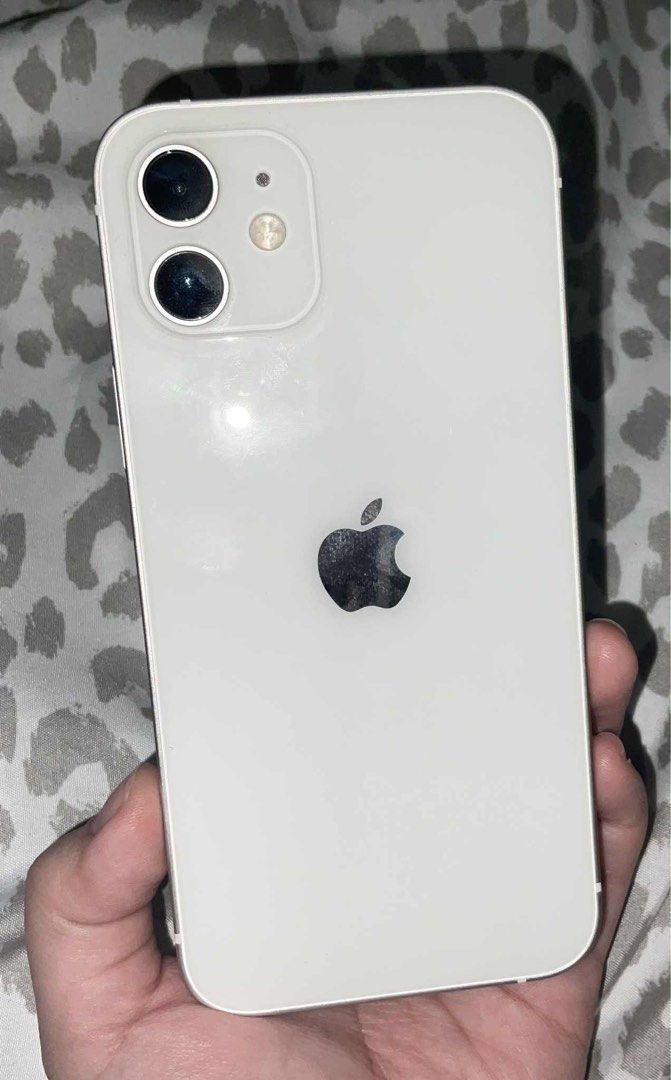 iPhone 12 - 256 GB in White (Category: iPhone 12 Series) located in Las Pinas. Submitted by handmedown143 (Listing ID 1398399210, Image 1). Description: * The scratches on the screen is only on the screen protector * Negotiable * Original Price: 38,000 INCLUSION: * Phone Charger (not originally iPhone charger) .