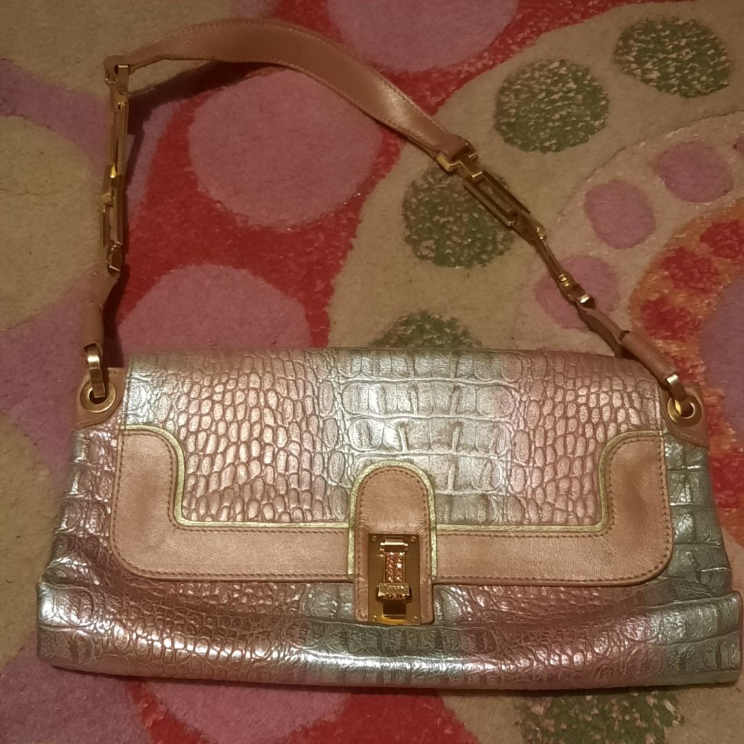 Metallic pink shoulder bag (Category: Shoulder Bags) located in Makati City. Submitted by cuco678 (Listing ID 1398441335, Image 1). Description: Y2k bag Croc print Mettalic Pink With rhinestone.