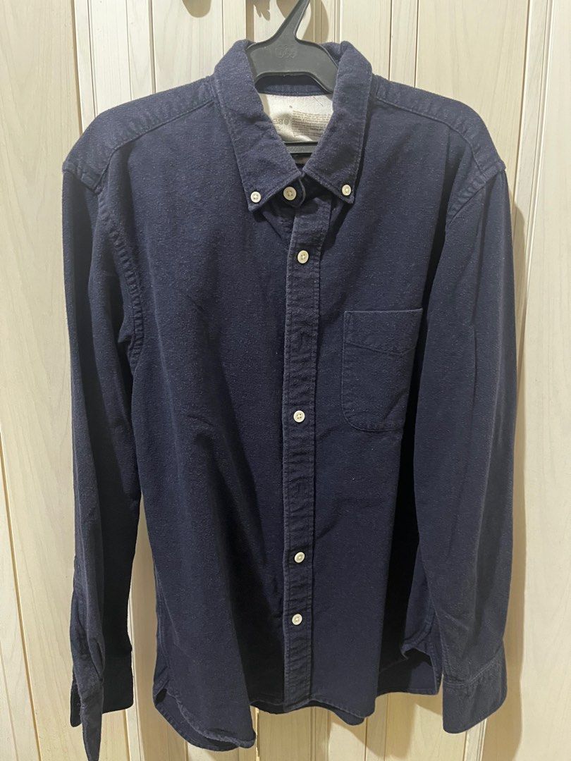 Muji Navy Blue Button Down Cotton Shirt (Category: Tshirts & Polo Shirts ) located in Quezon City. Submitted by ndpoppi (Listing ID 1398467132, Image 1). Description: see last photo for actual texture dimensions: l 26 x w 18 arm sleeve length 23.