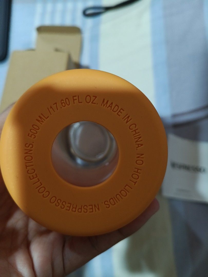 Nespresso Water Bottle with Silicone Sleeve (Category: Water Bottles & Tumblers) located in Quezon City. Submitted by mhiemime (Listing ID 1398451798, Image 2). Description: - Nespresso water bottle - Bamboo lid - Orange silicone sleeve - 500 ml / 17.60 fl oz capacity - Includes original box - Includes Nespresso information card ALL SALES AFTER THE DEALS ARE FINAL (NO RETURN NO REFUND).