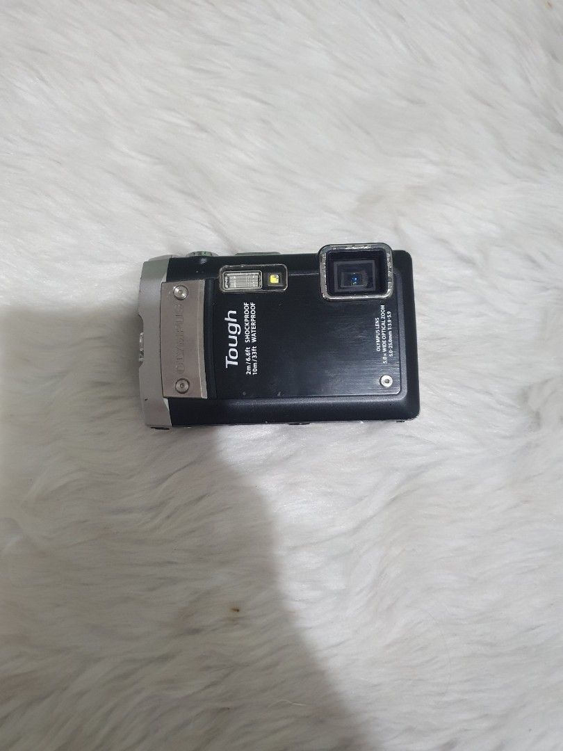 Olympus Tough TG-810 14MP Waterproof Camera (Category: Cameras) located in San Fernando. Submitted by prelovedby.lm (Listing ID 1398377335, Image 1). Description: - Olympus Tough TG-810 digital camera - Black and silver color - Waterproof - GPS functionality - Model: TG-810 - Features a flash and various buttons - Compact design free battery and charger needs repair on lens. already ask mang mand in central gallery 2500 for repair rfs need funds.