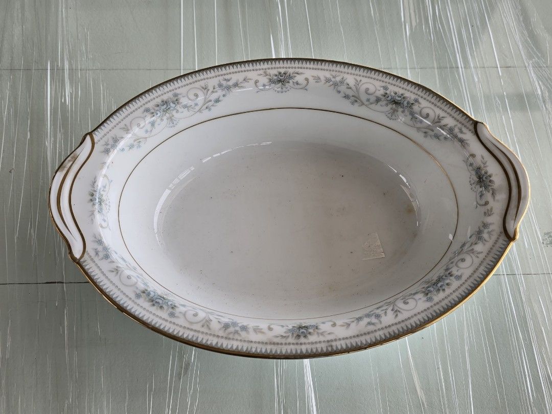 Oval Serving Dish with Floral Design (Category: Dinnerware & Cutlery) located in Taguig. Submitted by threadsntable (Listing ID 1398398657, Image 1). Description: Elegant oval serving dish with floral pattern and gold trim. Perfect for appetizers, side dishes, or desserts..