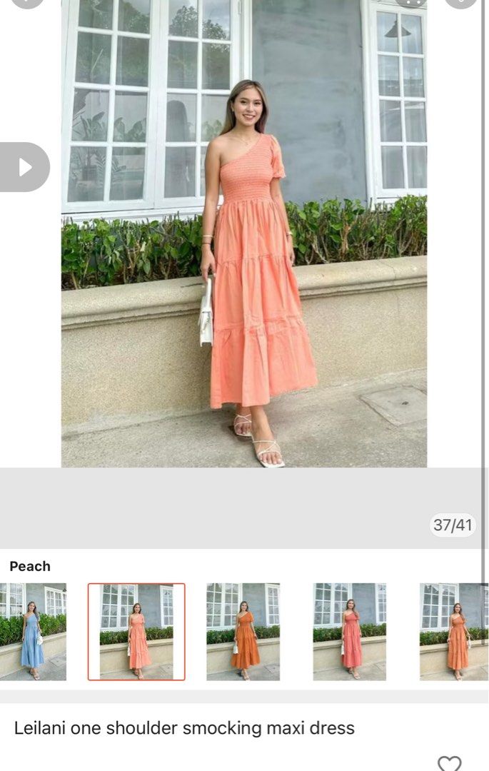 Peach One Shoulder Smocking Maxi Dress (Category: Dresses) located in Mandaluyong City. Submitted by iamjenfr (Listing ID 1398446297, Image 1). Description: - Leilani maxi dress - Peach color - One-shoulder design - Smocking details - Tiered skirt - Lightweight fabric - Maxi length - Suitable for various occasions Used only for a photoshoot. Rfs: decluttering.
