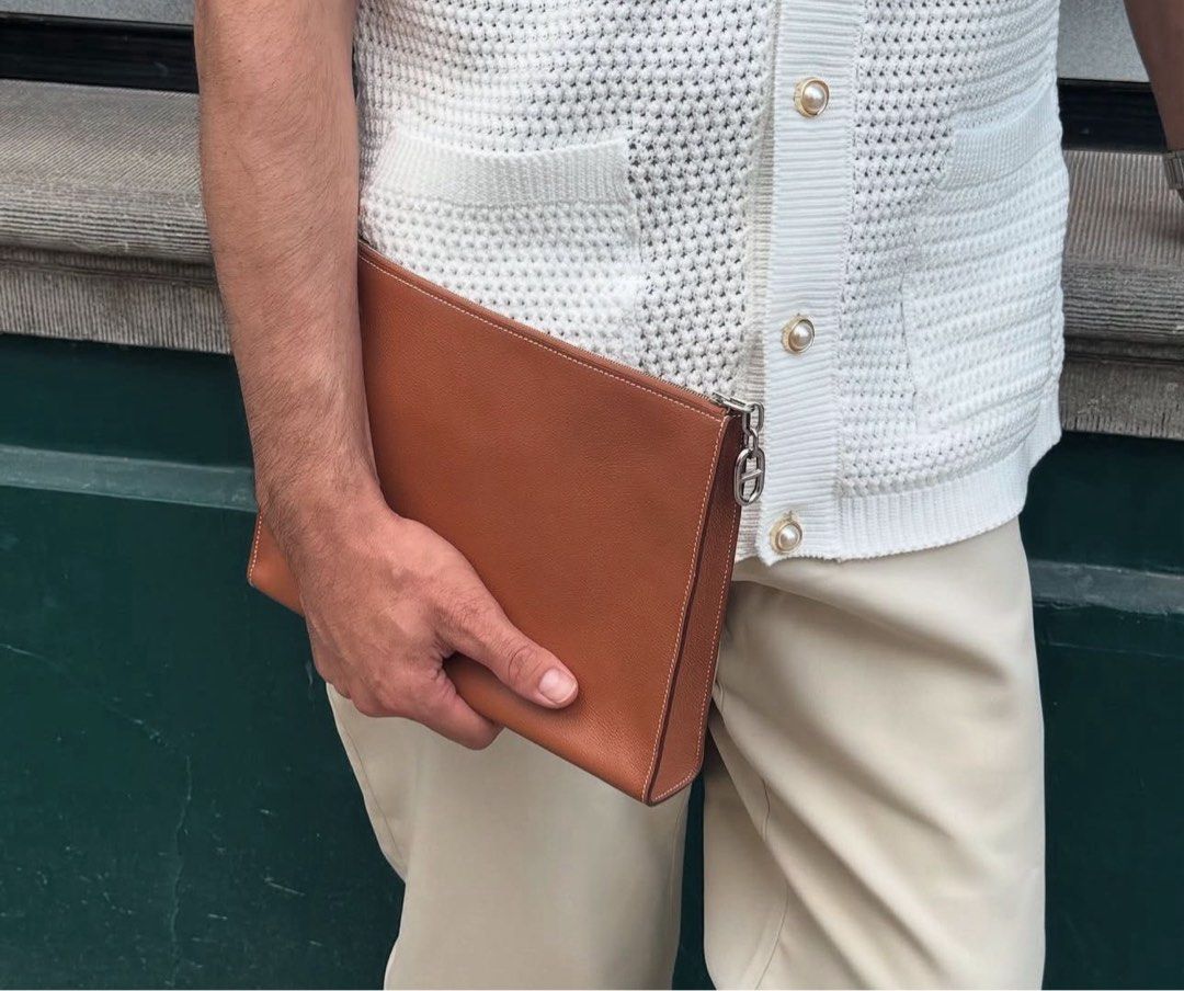 Sale! Hermes Zipengo Clutch GM (Etoupe) (Category: Luxury Bags & Wallets) located in Manila. Submitted by hellonixxx (Listing ID 1388981000, Image 2). Description: Sale! On Hand Hermes Zipengo Pouch GM Etoupe / PHW Evercolor calfskin - Zip closure with Chaine d’Ancre pull-tab - Interior phone pocket Made in France Metallic finish: Palladium plated Dimensions: L 27.7 x H 21.5 x D 4.7 .