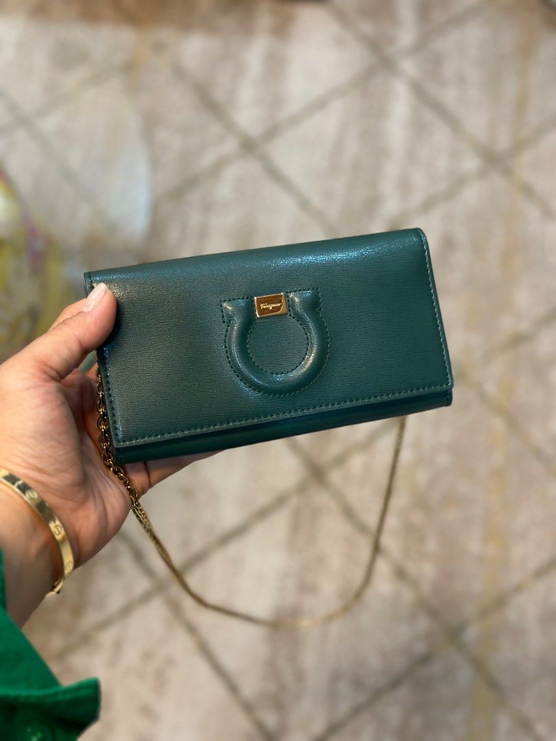 Salvatore Ferragamo Wallet On Chain (Category: Luxury Bags & Wallets) located in Bacolod City. Submitted by bxb_jewelry (Listing ID 1398485122, Image 2). Description: Salvatore Ferragamo Wallet On Chain - Elegant green color - Features the iconic Gancini clasp - Comes with original box - Perfect for everyday use or special occasions - minimal signs of wear.