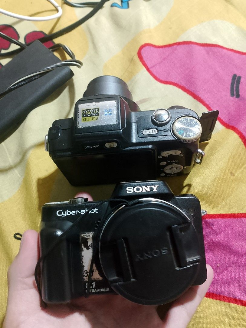 Sony Cybershot DSC-H10 Digital Camera (Category: Cameras) located in Manila. Submitted by allaboutcollections (Listing ID 1398460535, Image 1). Description: - Sony Cybershot DSC-H10 digital (defective for parts) - 8.1 megapixel lens - Includes lens cap - Built-in flash - Function buttons - Information display screen - Power and menu buttons - Black color Yung Isa may power pa Yung Isa Naman Wala ng power good for parts.