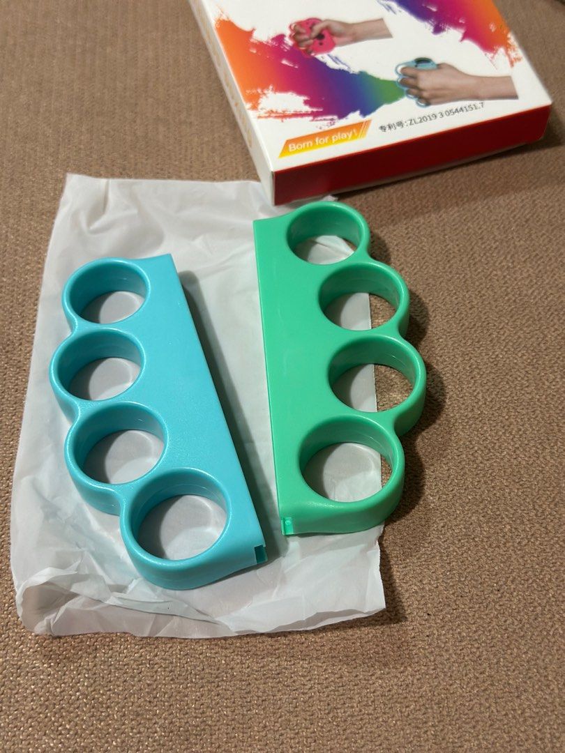 Switch Joy-Con Handle Fit Boxing 2-Piece Grip (Category: Controllers) located in Davao. Submitted by favoritepreloved (Listing ID 1398507164, Image 1). Description: This is a set of two handles specifically for the Nintendo Switch Joy-Con. Perfect for immersive games like Fit Boxing and Fit Boxing 2! Just by wearing it, you’ll feel like a real boxer, making your game even more exciting. .