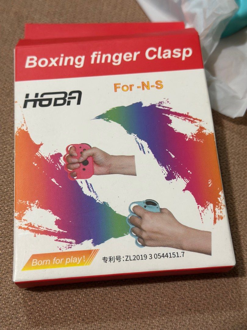 Switch Joy-Con Handle Fit Boxing 2-Piece Grip (Category: Controllers) located in Davao. Submitted by favoritepreloved (Listing ID 1398507164, Image 2). Description: This is a set of two handles specifically for the Nintendo Switch Joy-Con. Perfect for immersive games like Fit Boxing and Fit Boxing 2! Just by wearing it, you’ll feel like a real boxer, making your game even more exciting. .