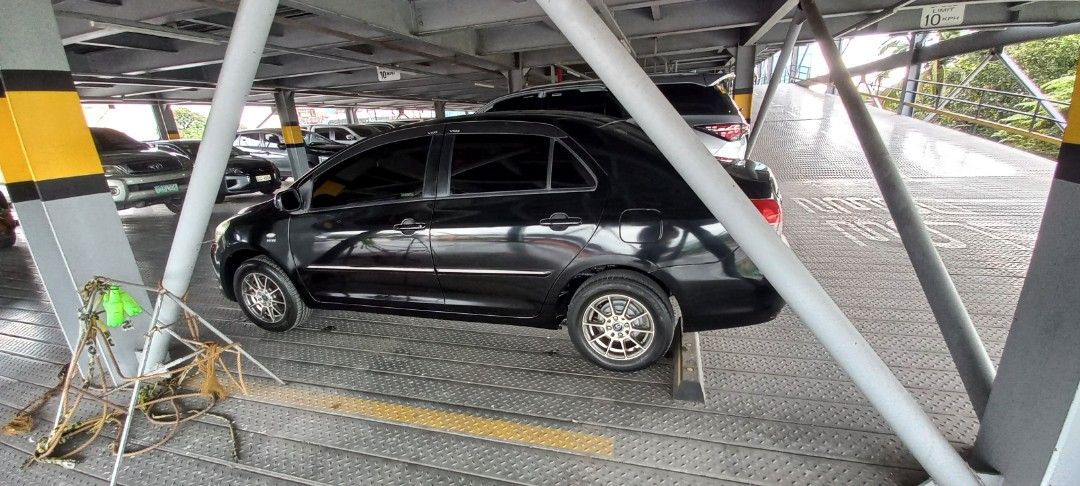 Toyota Vios E Manual (Category: Used Cars) located in Manila. Submitted by patlady1578619 (Listing ID 1398494048, Image 3). Description: Vios 2008 Manual series E Tire 90% newly aircon Denzo with reciept. newly tinted. newly battery with reciept. seat cover leather Blue convi. Black. Andriod set up ampli Xplod with subwoofer, Spk. Pioneer. Ready for long drive engine All condition. Newly paint black coated last april 2024. 2nd Mags Evolution aloy