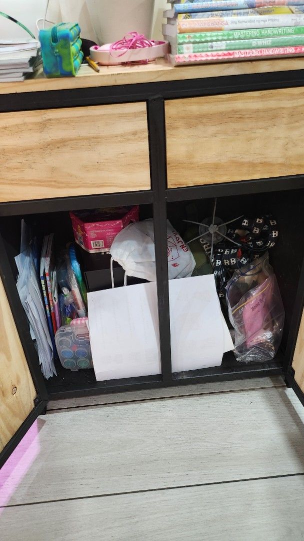 Wooden Storage Cabinet with Black Frame (Category: Shelves, Cabinets & Racks) located in Quezon City. Submitted by ishopph (Listing ID 1398351766, Image 2). Description: - Wooden storage cabinet real pine wood - Black frame - Two doors - Multiple compartments for storage - Sturdy construction - Ideal for home or office use - Provides ample storage space Condition: 8/10 Issue: slightly rough finish RFS: Upgrading FOR PICK UP ONLY! pm for other dee