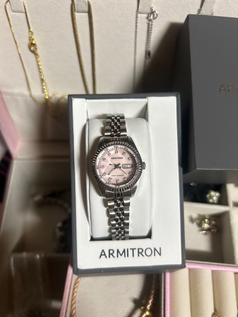 Armitron Silver Pink Dial (Category: Women's Watches) located in Taguig. Submitted by hanzdeclutter (Listing ID 1398525075, Image 2). Description: - Original Armitron women's watch Silver pink dial stainless steel band water resistant with original box resized to 6.5 inches (Includes extra links) used a few times only likenew condition rfs: too much silver watch | I'm willing to swap to Armitron two-toned black dial location: Taguig City j&t cour
