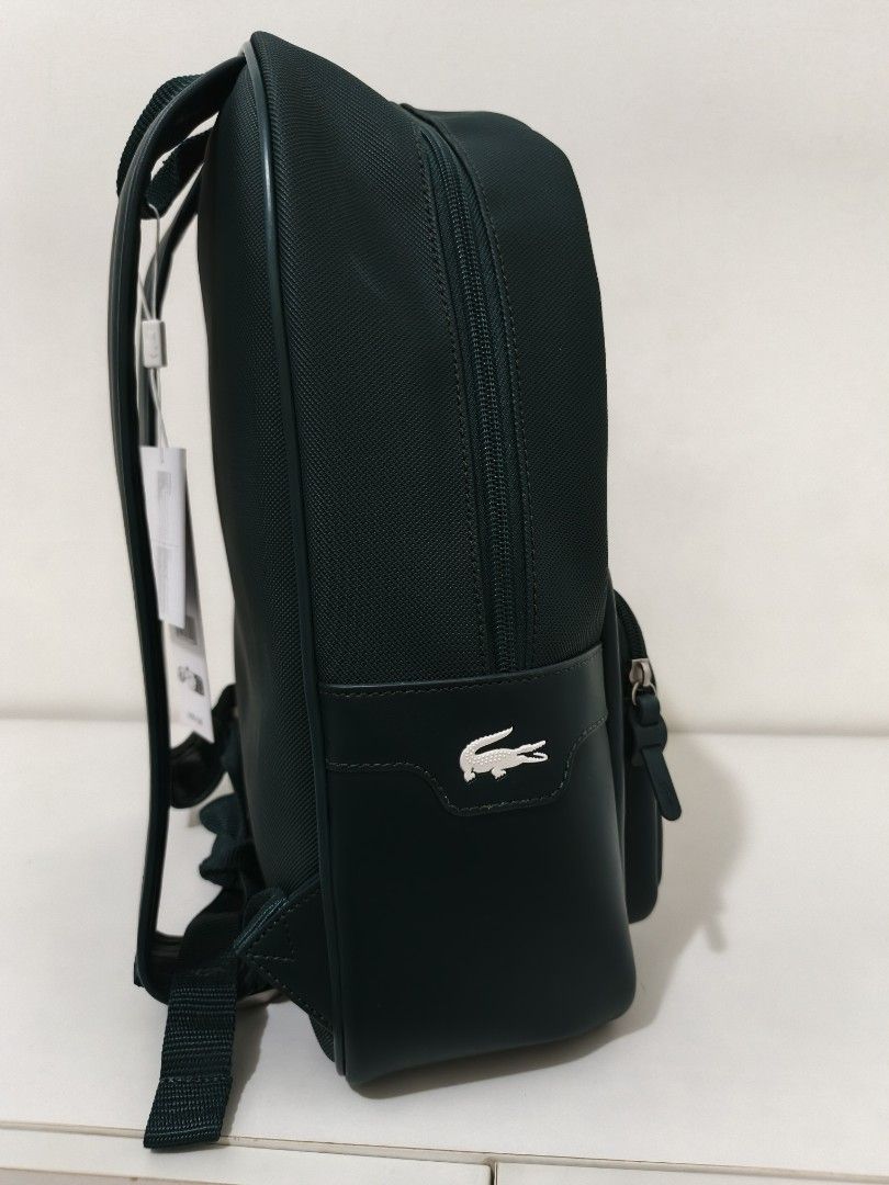 Authentic Brand New Lacoste Green Backpack (Category: Backpacks) located in Paranaque City. Submitted by msperrine (Listing ID 1398598736, Image 3). Description: 100% Guaranteed Authentic – Imported from the U.S. SRP: ₱12,000 (includes shipping and taxes) Selling Below SRP (Final price as posted) Inclusions: 🛍️ Original paper bag 🏷️ Tag intact 📸 Actual photos of the item (we own all photos) Location: Sucat, Parañaque Shipping Options: Self pic