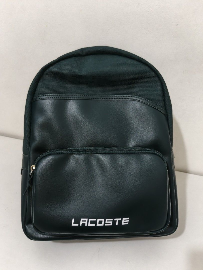 Authentic Brand New Lacoste Green Backpack (Category: Backpacks) located in Paranaque City. Submitted by msperrine (Listing ID 1398598736, Image 2). Description: 100% Guaranteed Authentic – Imported from the U.S. SRP: ₱12,000 (includes shipping and taxes) Selling Below SRP (Final price as posted) Inclusions: 🛍️ Original paper bag 🏷️ Tag intact 📸 Actual photos of the item (we own all photos) Location: Sucat, Parañaque Shipping Options: Self pic
