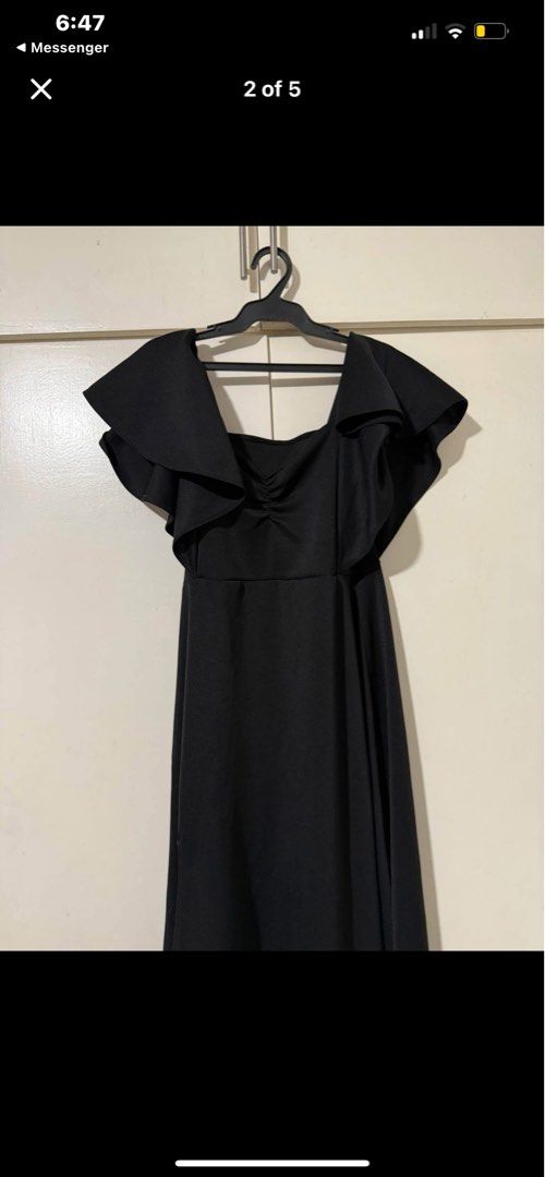 Black long gown dress (Category: Evening dresses & gowns) located in Pasig City. Submitted by alcjossa (Listing ID 1398679129, Image 3). Description: Off shoulder or on shoulder Butterfly sleeves Freesize Long skirt with slit Sinukat lang, hindi po nasuot dahil pink po pala ang motif. Rfs: no storage Loc Marikina Lalamove ready.
