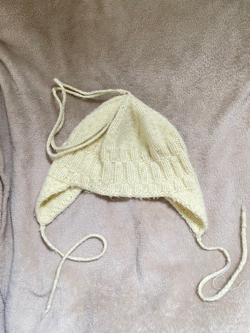 Butter Yellow Knitted Hat (Category: Hats & Beanies) located in Rizal. Submitted by declutterwsky (Listing ID 1398587606, Image 1). Description: Used once just to take pictures. It needs washing lang kasi dusty but the color is really nice in real life. :))) rfs: walang event na mapagsuotan .