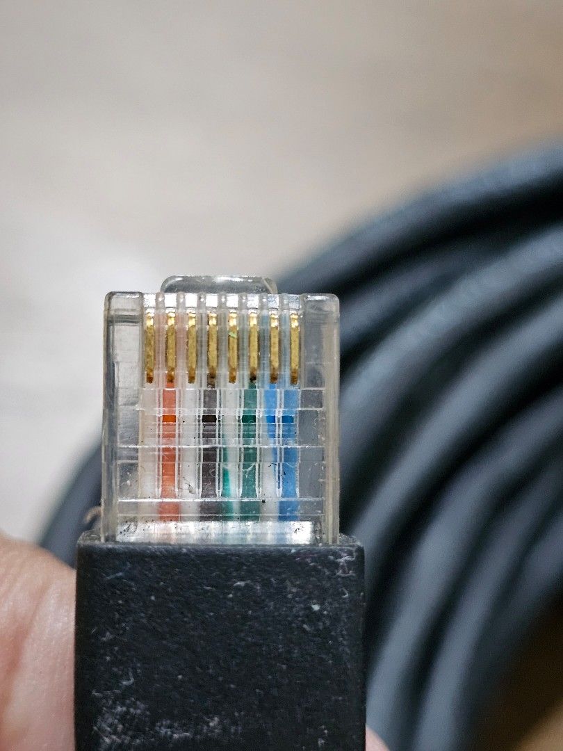 CAT5e UTP Patch Cable 7 (Category: Cables & Adaptors) located in Rawang. Submitted by dss79 (Listing ID 1398565357, Image 2). Description: - Black CAT5e UTP patch cable -7 meters - RJ45 connectors on both ends - Cable is coiled and secured with a green tie - Compliant with TIA/EIA-568-B.2 standards - Suitable for network connections.