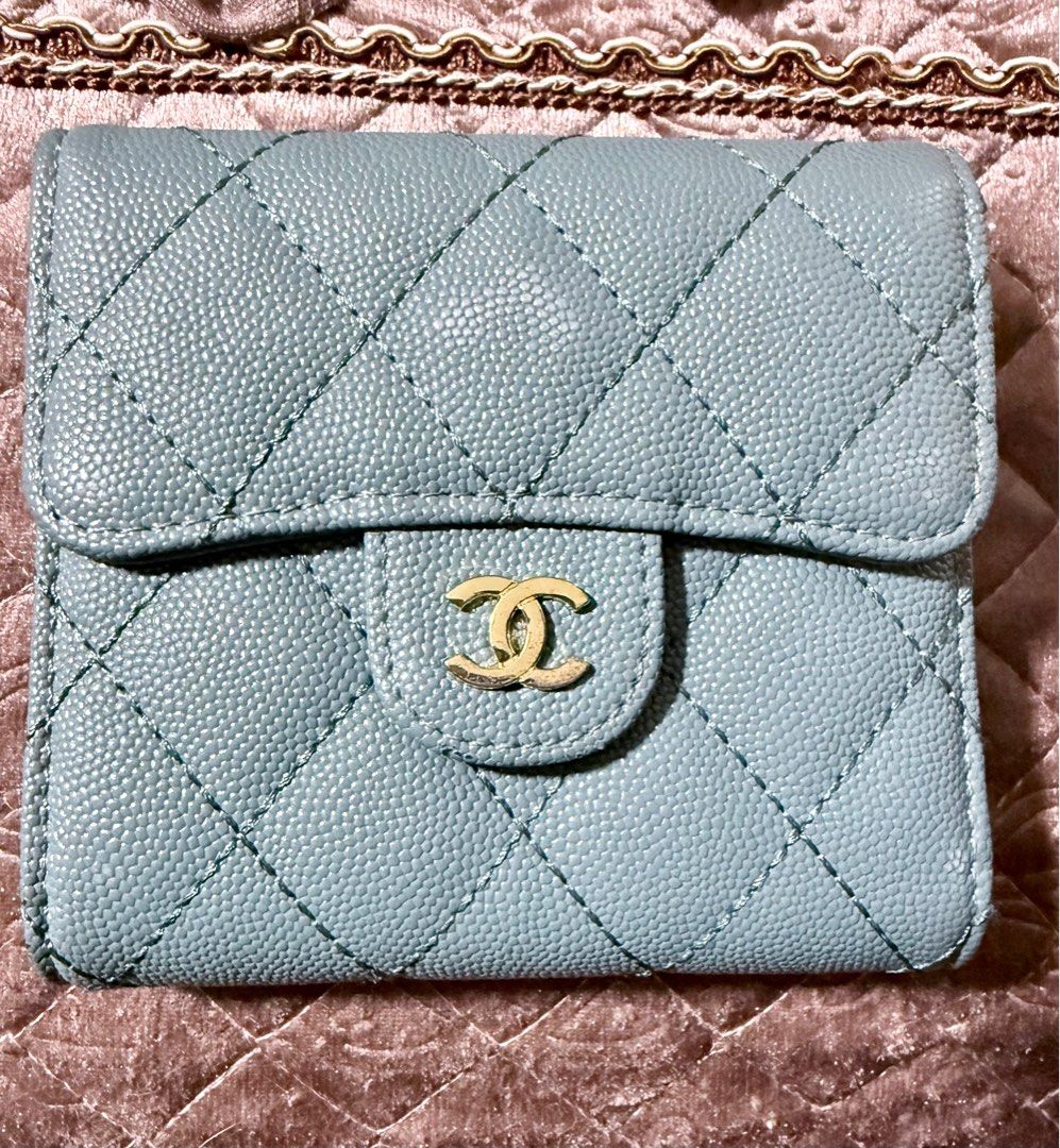 Chanel Quilted Trifold Wallet (Category: Luxury Bags & Wallets) located in Cavite. Submitted by lady_speculator_ph (Listing ID 1398698949, Image 1). Description: ✨ Quilted design with flap closure ✨ Iconic gold-tone CC logo ✨ Multiple card slots for organization ✨ Includes a zippered compartment ✨ Elegant light blue interior ✨ Serial number visible Note: Authenticity is not guaranteed There are minimal signs of use. Please manage your expectation