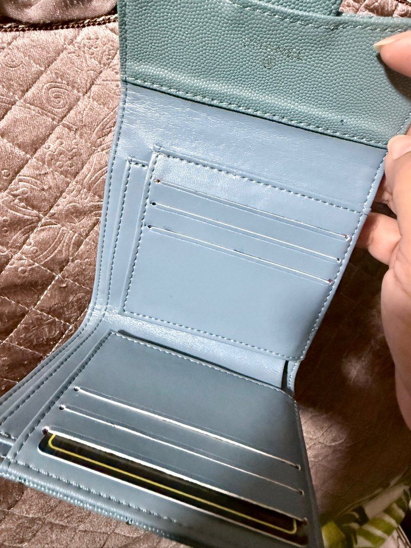 Chanel Quilted Trifold Wallet (Category: Luxury Bags & Wallets) located in Cavite. Submitted by lady_speculator_ph (Listing ID 1398698949, Image 3). Description: ✨ Quilted design with flap closure ✨ Iconic gold-tone CC logo ✨ Multiple card slots for organization ✨ Includes a zippered compartment ✨ Elegant light blue interior ✨ Serial number visible Note: Authenticity is not guaranteed There are minimal signs of use. Please manage your expectation