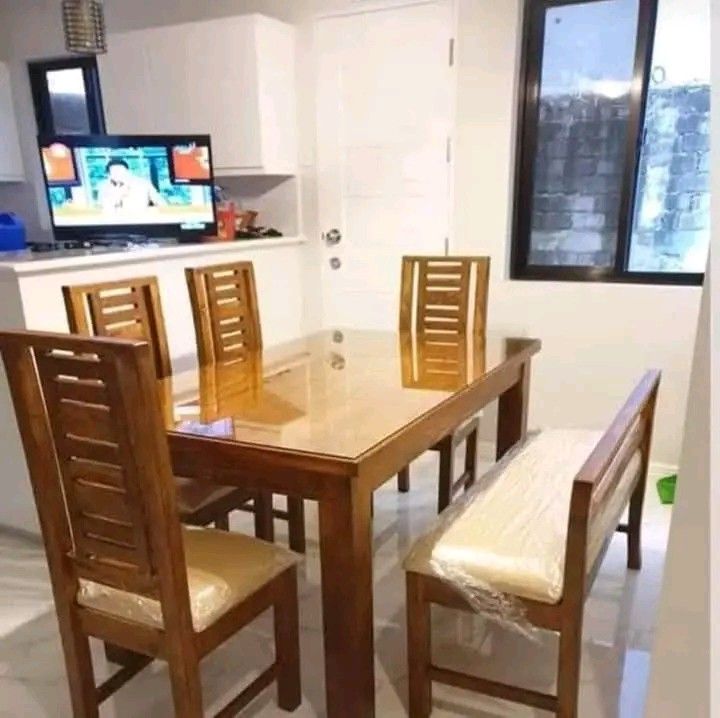 Dining set with top glass (Category: Tables & Sets) located in Mabalacat. Submitted by arlenemamangun01 (Listing ID 1398567644, Image 3). Description: High-quality Dining table set at an affordable price👌 Materials used: 📌Gemelina & mahogany wood 📌Uratex foam 📌German leather & fabric 📌Duco paint finished MADE TO ORDER⚒️ NO DP NEEDED✅ FREE TOP GLASS😍 COD & FREE DELIVERY 4 seater (3ft by 4ft) 6 seater (3ft by 5ft) 8 seater (3ft by 6ft) 10 sea