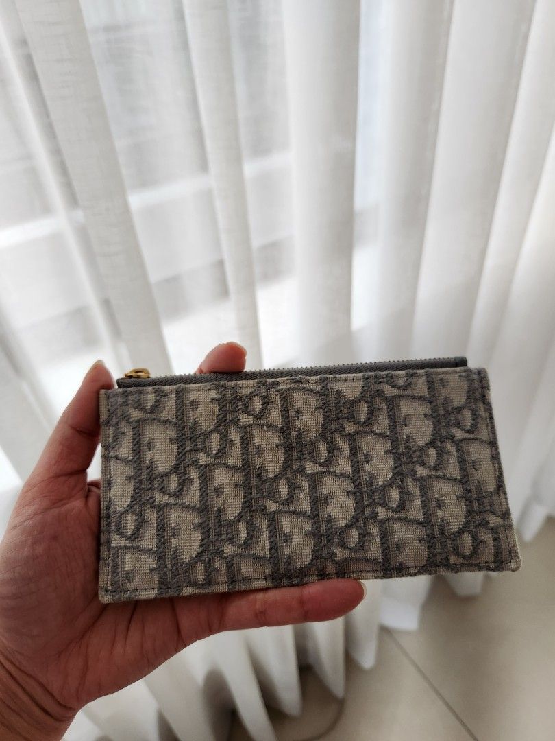 Dior saddle pouch with chain almost brand new (Category: Luxury Bags & Wallets) located in San Juan City. Submitted by dailydealsphest2010 (Listing ID 1398554923, Image 3). Description: almost brand new condition 💯💯💯 authentic Key features that support this identification are: ​The distinctive asymmetrical flap design, which is the signature shape of the Dior Saddle line. ​The use of the iconic Dior Oblique jacquard canvas (monogram pattern). 