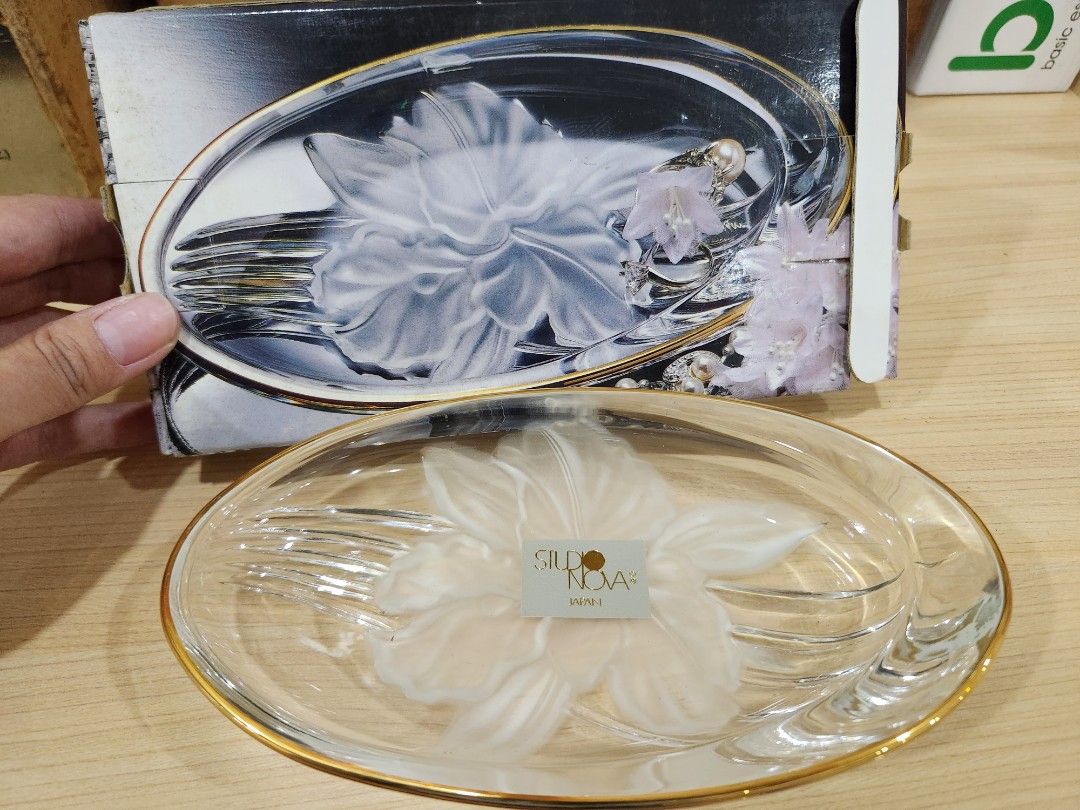 Glass Dish with Floral Design (Category: Other Kitchenware & Tableware) located in San Juan City. Submitted by iamryn (Listing ID 1398570362, Image 1). Description: - Silde Nova glass dish - Delicate floral design - Gold-colored trim - Unique oval shape - Unused condition - Comes with original packaging - Ideal for serving treats or decoration.