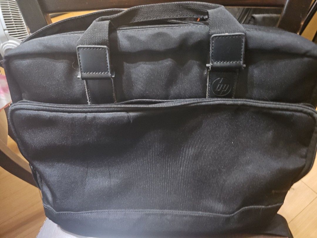 HP Laptop Bag Shoulder / Hand Carry (Category: Laptop Bags & Sleeves) located in Pasig City. Submitted by JRisEn (Listing ID 1398677333, Image 1). Description: HP Laptop Bag - Black - Fits upto 15-17 inch laptop - Zipper handle need replacement for better grip..