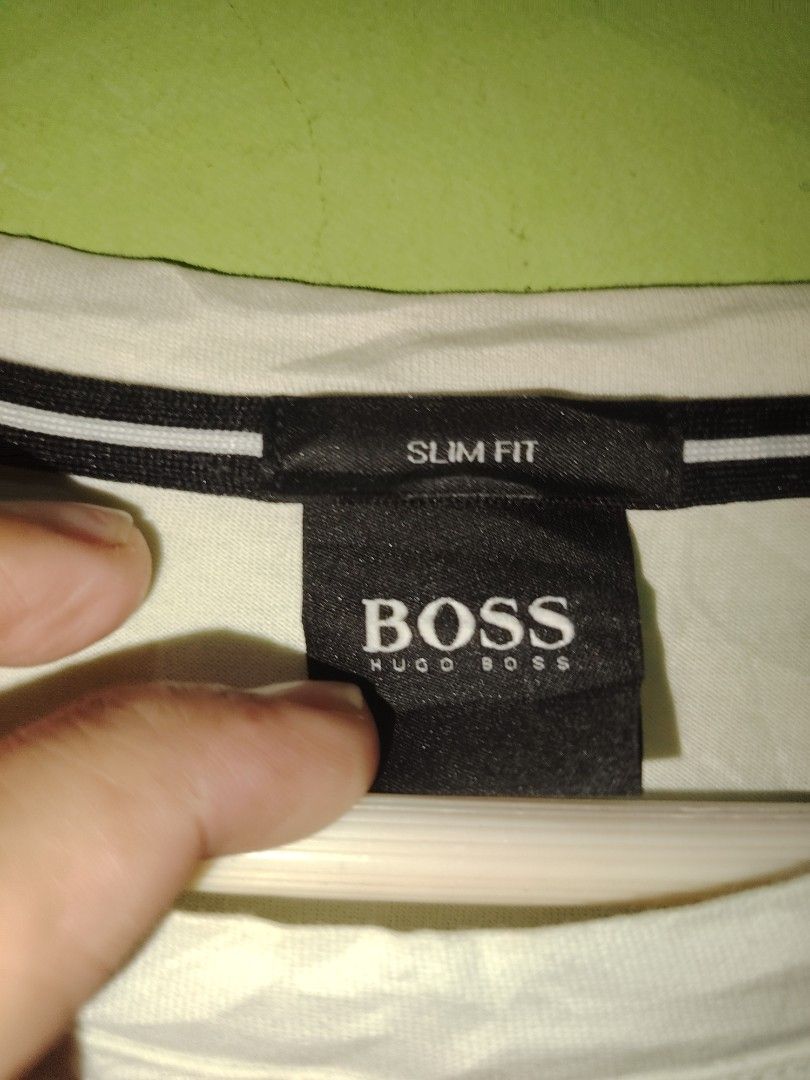 HUGO BOSS (Category: Activewear) located in Pasig City. Submitted by michelle.asuki (Listing ID 1398629956, Image 2). Description: HUGO BOSS SHIRT EXCELLENT MEDIUM 21 WIDTH 27 LENGHT 900.
