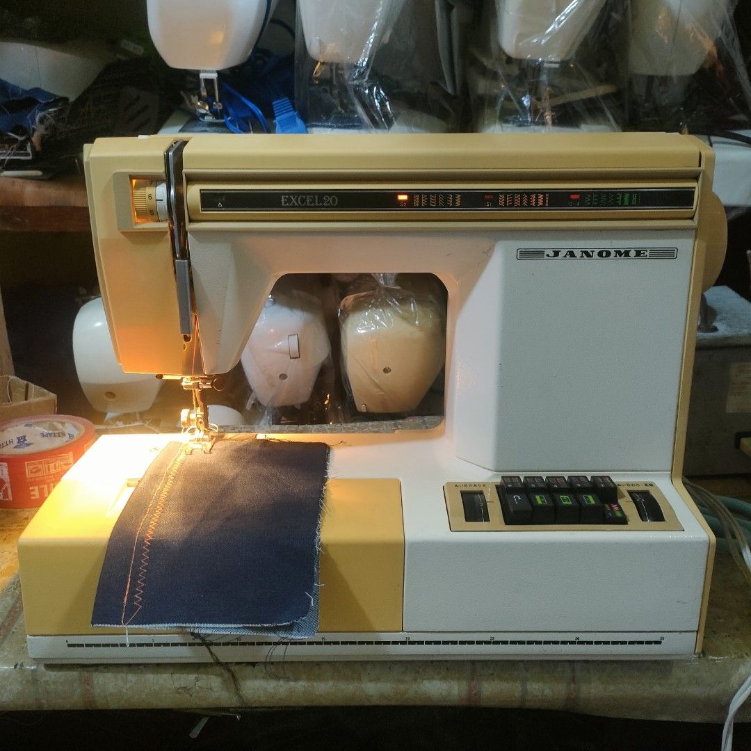 Janome Excel 80 Sewing Machine (Category: Craft Supplies & Tools) located in Manila. Submitted by faststone-c3c8 (Listing ID 1398638645, Image 3). Description: - Janome Excel 80 sewing machine - Multiple stitch patterns and settings - Includes foot pedal - Features storage compartment with stitch guides - Cream and beige color scheme with black control buttons - In working condition.