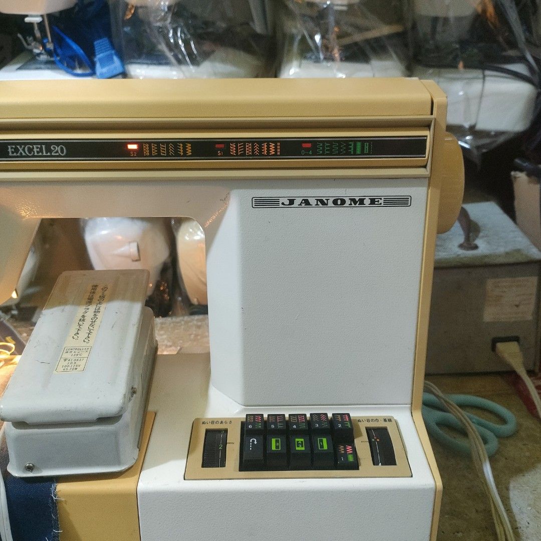 Janome Excel 80 Sewing Machine (Category: Craft Supplies & Tools) located in Manila. Submitted by faststone-c3c8 (Listing ID 1398638645, Image 2). Description: - Janome Excel 80 sewing machine - Multiple stitch patterns and settings - Includes foot pedal - Features storage compartment with stitch guides - Cream and beige color scheme with black control buttons - In working condition.
