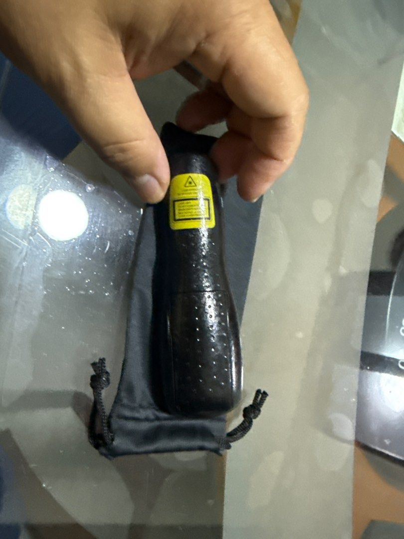 Logitech Presenter with Laser Pointer (Category: Other Accessories) located in Singapore. Submitted by madchineserabbit (Listing ID 1398698878, Image 2). Description: - Includes presenter, USB receiver, and carrying pouch - Features: - Forward/back buttons - Laser pointer - Blank screen button - Perfect for presentations!.