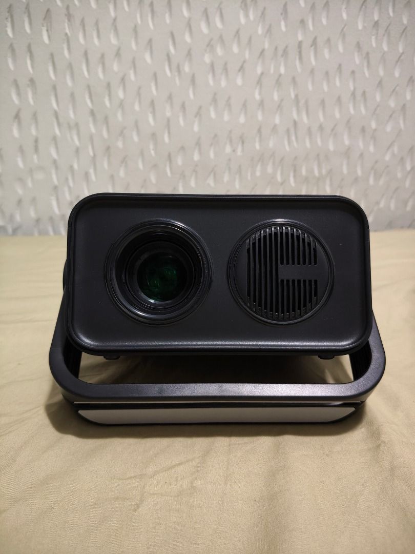 Mini projector (Category: Projectors) located in Las Pinas. Submitted by salvalancer (Listing ID 1398658291, Image 2). Description: Almost brand new. Reason for selling, thinking to buy new one. In good condition. This projector don't have wifi. .