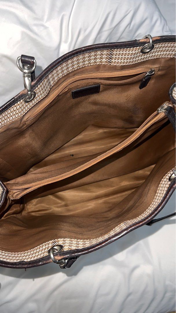 Ralph Lauren Houndstooth Plaid Tote Bag (Category: Luxury Bags & Wallets) located in Cebu City. Submitted by kikinggwp_ (Listing ID 1398576323, Image 2). Description: - Lauren Ralph Lauren tote bag - Plaid pattern (brown and beige) - Spacious interior - Zippered pocket - Leather trim and handles - Silver hardware Issues: - Minor wear on handles - Fading near the clasps - Stains on the inside.