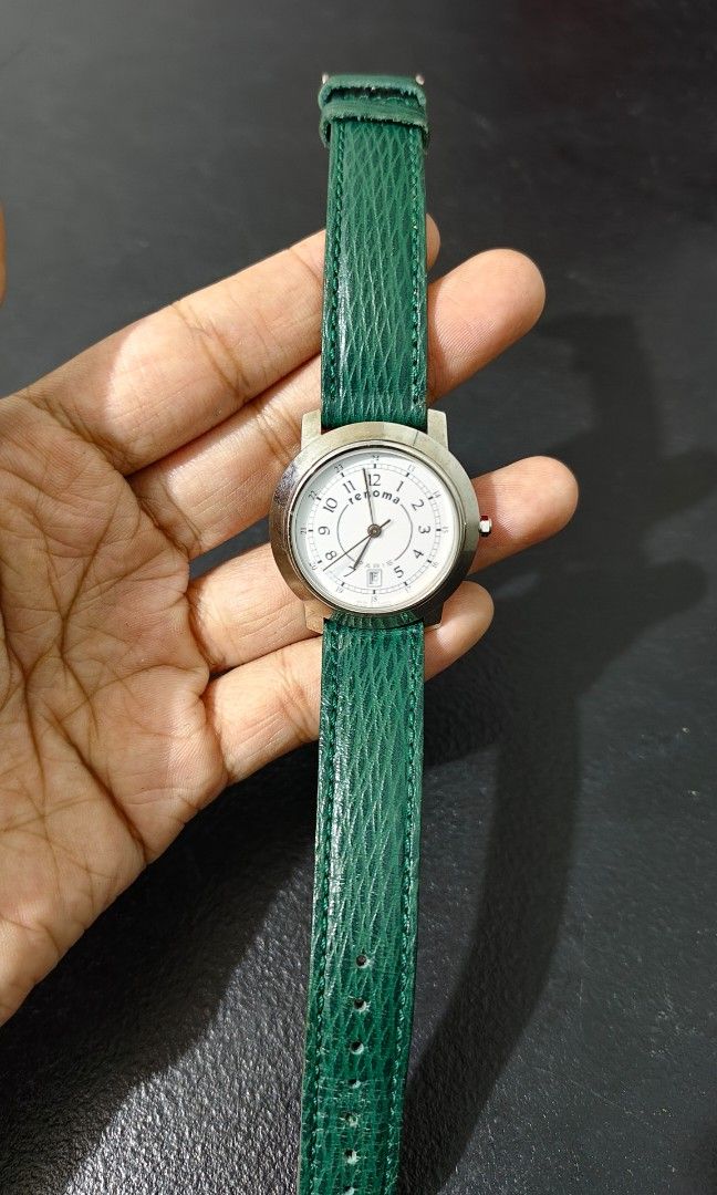 Renoma analog watch vintage (Category: Women's Watches) located in Manila. Submitted by lavishco (Listing ID 1398630755, Image 2). Description: Renoma green strap(orig strap) 8-8.5inches swiss quartz japan water resistant ang class when wornn. with free box location: Olongapo.
