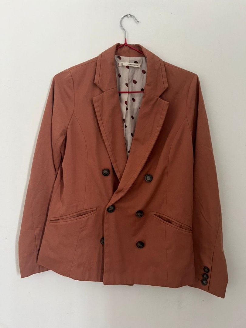 Rust Orange Bundle (Category: Coats, Jackets and Outerwear) located in Shah Alam. Submitted by thriftbundle (Listing ID 1398527863, Image 1). Description: Size = M suitable for 50kg below Rust orange double-breasted blazer. Classic design with notched lapel, button details, and functional pockets. Polka dot lining. Versatile for any occasion..