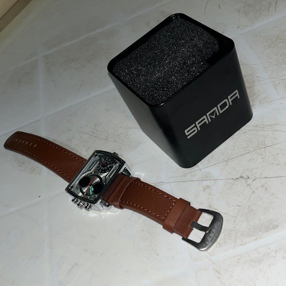 SANDRA 6032 Analog - Digital Electronic Watch (Category: Men's Watches) located in Manila. Submitted by refinedthreads (Listing ID 1398626663, Image 2). Description: - Brand new SAMDA men's watch - Stylish brown leather strap - Features multiple sub-dials - Comes with original box - Unworn condition ✅OPEN FOR TRADE ✅OPEN FOR MEETUP (tarlac city).