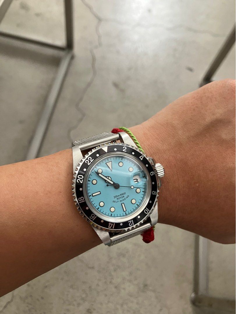 Seiko/Tudor Mod Tiffany dial GMT (Category: Men's Watches) located in Manila. Submitted by zolnak (Listing ID 1296095051, Image 2). Description: Used less than 5 times. Practically new. 20mm lug to lug. Leather strap is old 18mm. Can or can not be included. Silicone strap for reference only. Screw down crown. Bi-directional friction bezel. Reliable Seiko NH35 movement. Nice lume effect with dial. Bought online without a strap or bracelet. Afforda