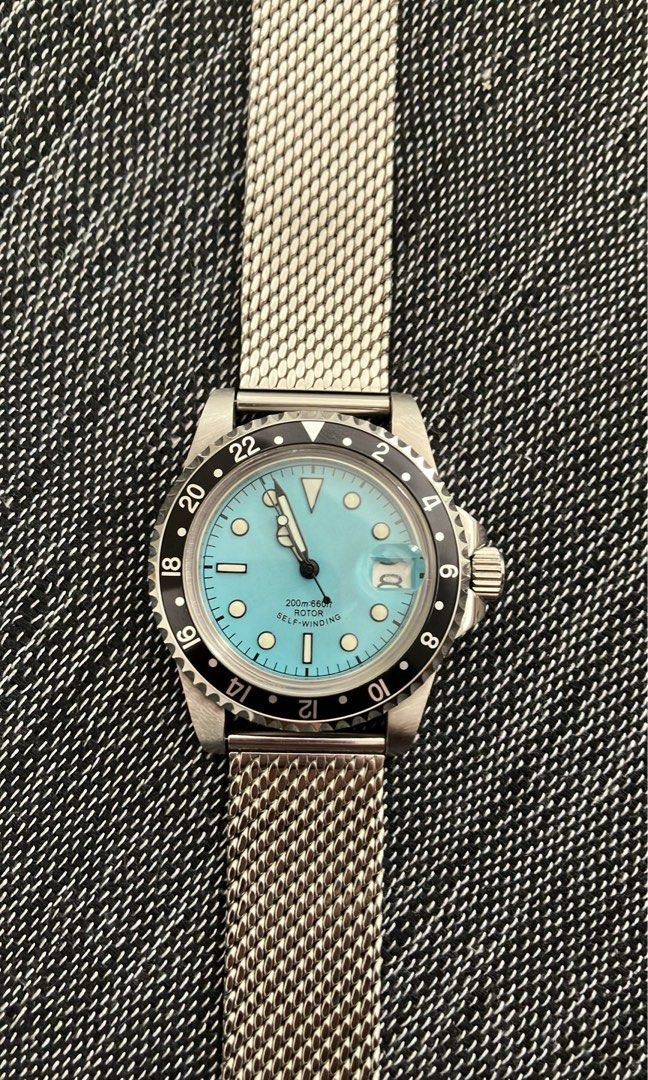 Seiko/Tudor Mod Tiffany dial GMT (Category: Men's Watches) located in Manila. Submitted by zolnak (Listing ID 1296095051, Image 1). Description: Used less than 5 times. Practically new. 20mm lug to lug. Leather strap is old 18mm. Can or can not be included. Silicone strap for reference only. Screw down crown. Bi-directional friction bezel. Reliable Seiko NH35 movement. Nice lume effect with dial. Bought online without a strap or bracelet. Afforda