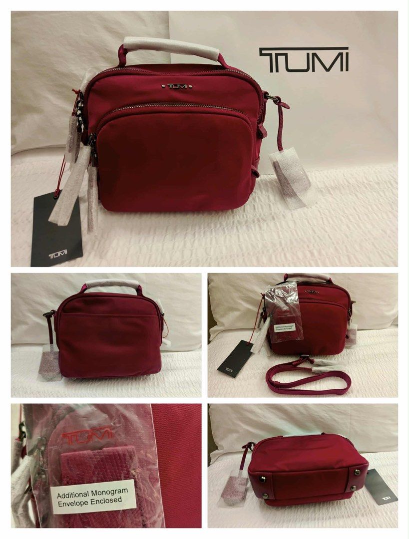 TUMI TAMY Crossbody (Category: Cross-body Bags) located in Manila. Submitted by mayeli (Listing ID 1398563353, Image 1). Description: Color: dark sherry Limited only Dimension 18H x 5.75D x 21W cm Weight 0.52 kg.