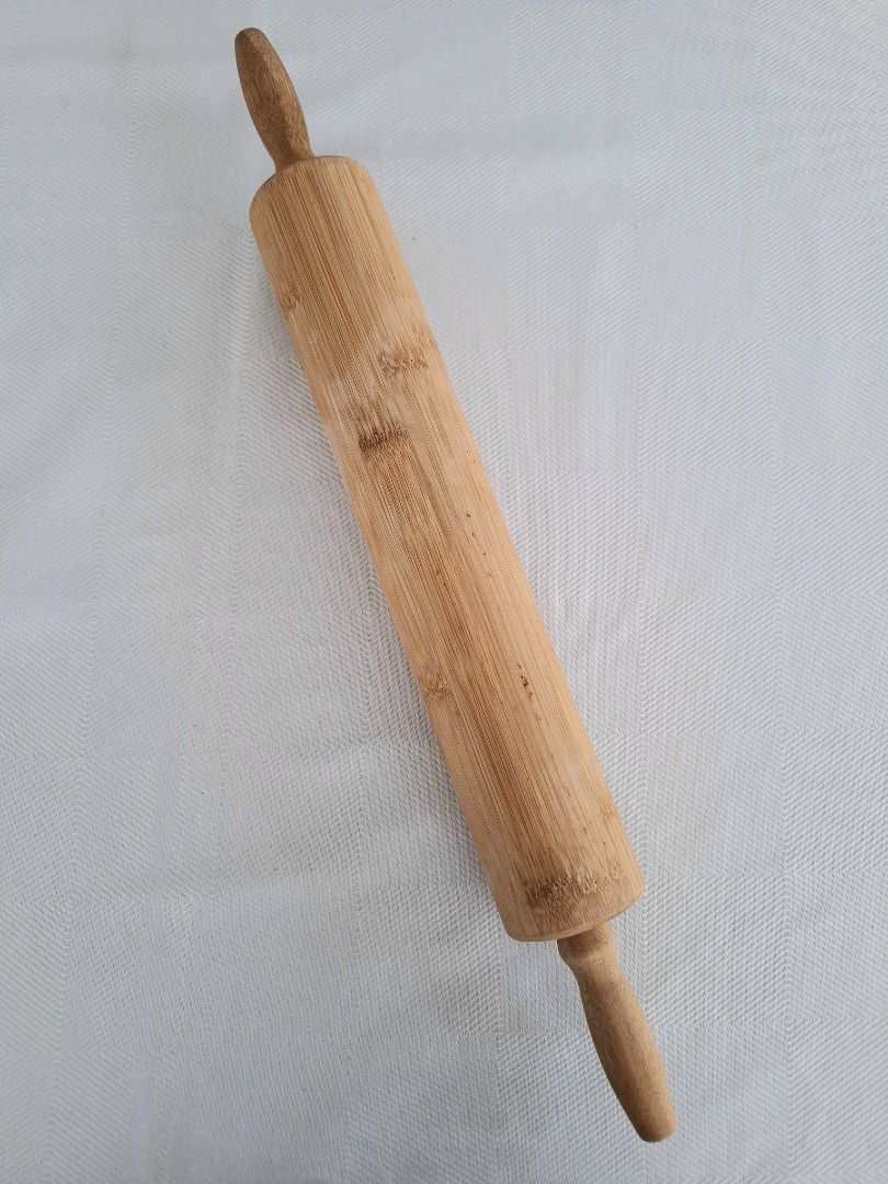 Wooden Rolling Pin (Category: Bakeware) located in Antipolo. Submitted by lello.mom (Listing ID 1398581501, Image 1). Description: - Bamboo rolling pin - Features two handles - Perfect for flattening dough and pastries - A must-have baking tool.