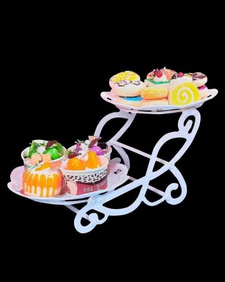 2-Tier White Dessert Stand (Category: Bakeware) located in Manila. Submitted by lyfrancois14 (Listing ID 1398814924, Image 2). Description: - 2-tier cake stand - Delicate white design - Ideal for desserts and fruits - Perfect for parties and events - Enhances presentation.